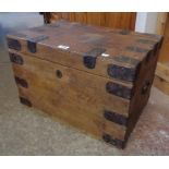 A 22" 19th Century iron bound stained pine trunk with flanking handles