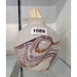 A glass vase of swirled marble design signed by Anthony Stern