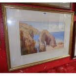 Arther Suker: a gilt framed watercolour, depicting a coastal view with cliffs - signed - 11 1/4" X