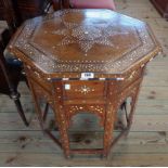 A 24" 19th Century ivory and bone inlaid and ebony lined hardwood Moorish table with octagonal top