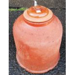 A terracotta rhubarb forcer with associated lid