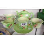 A collection of Carltonware primula pattern including teapot, jugs, etc.