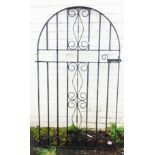 A wrought iron garden gate