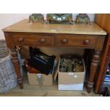 A 34 1/2" Victorian part wood grained pine side table with two frieze drawers, set on turned legs