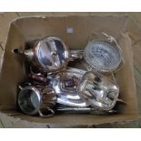 A box containing silver plated three piece tea set, hotel plate similar, two pheasant pattern