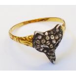 A yellow metal ring with diamond encrusted fox mask centre