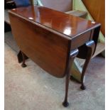 A 33" 19th Century mahogany Pembroke table with single gated action, set on cabriole legs with pad