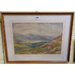 Philip Mitchel: a gilt framed watercolour depicting a mountain landscape with lake - signed
