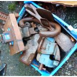 A box containing a quantity of bench vises, etc.