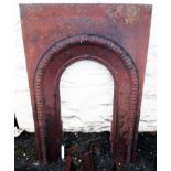 A Victorian cast iron arch fronted bedroom fire surround