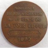 A late 19th Century bronze Eiffel Tower souvenir ascension medal from the International Exposition