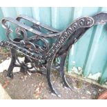 A pair of cast iron bench ends