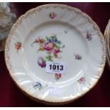 Seven German plates with painted floral decoration, bearing mark for Schlesische Porzellanfabrik