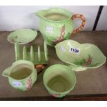 Eight pieces of Carltonware foxglove pattern including toast rack, jugs on green ground, etc.