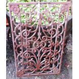 An ornate cast iron door mat