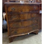 A 28" reproduction book matched flame mahogany veneered serpentine chest of four long drawers, set