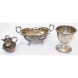 A silver egg cup, ornate gilt lined salt and miniature jersey can - various age and makers