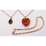 A garnet drop pendant on imported 9ct. gold chain - sold with a honey amber heart on marked 9ct