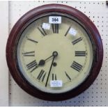 An antique stained wood cased dial wall timepiece with spring driven movement