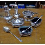 A harlequin silver plated condiment set including Elkington mustard pot with silver spoon