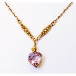 An early 20th Century marked 9c yellow metal pendant necklace, set with heart shaped amethyst and