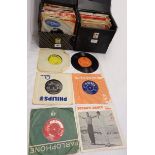 A collection of vinyl 45 singles including Cher, Bay City Rollers, ABBA, Prince, Depeche Mode,