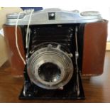 A vintage Agfa Venture 66 Deluxe 'US Zone' folding camera in leather case