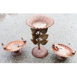 A cast metal bird bath - sold with two smaller bird pattern bird baths