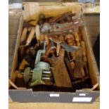 A box containing carpenters tools including Stanley Bailey 4 and 4 1/2 planes, vise, etc.