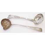 A Victorian silver brandy ladle with embossed bowl - sold with a Victorian silver sifter ladle
