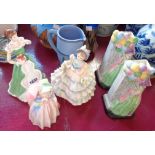 Three Royal Doulton figures comprising Miss Demure HN 1402 (cracked), Hannah HN 3369 and Merry