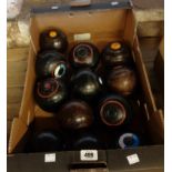 A box containing a quantity of bowling woods including a set of four Taylor Rolph & Co. Ltd Pershore