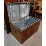 A 3' 2" antique stained hardwood and metal lined transit trunk with copper strap latches and