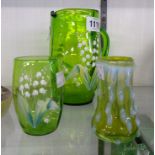 A pate-sur-pate jug and glass - sold with a small green glass vase