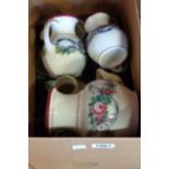 A box containing three graduated jugs and other decorative jugs - various condition