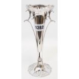 An 8 1/2" Mappin & Webb silver ornate trumpet vase with pierced scroll decoration and open