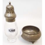A silver topped glass sugar caster - sold with a marked "sterling silver" bowl with embossed band of