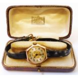 A boxed early 20th Century marked 375/9 rose metal cased lady's wristwatch with octagonal bezel,