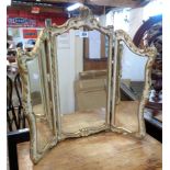 A 20th Century Rococo style parcel gilt triple dressing table mirror