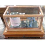 A late 20th Century Casella barograph in stained wood case