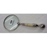 A modern silver plated magnifying glass with nacre clad handle