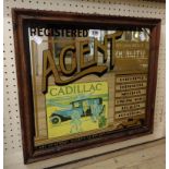 A stained wood framed reproduction Cadillac advertising mirror