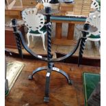 A wrought iron Gothic style candelabrum with barley twist decoration