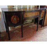 A 5' 19th Century stained mahogany bow front sideboard with central frieze drawer and flanking
