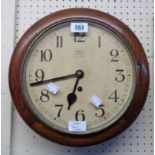 An early 20th Century polished oak cased wall dial timepiece with Anvil spring driven movement