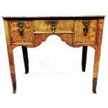 A 36 1/2" early Georgian figured walnut cross banded and strung lowboy with central frieze drawer,