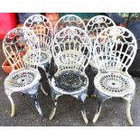 A set of six cast aluminium garden chairs with pierced decoration