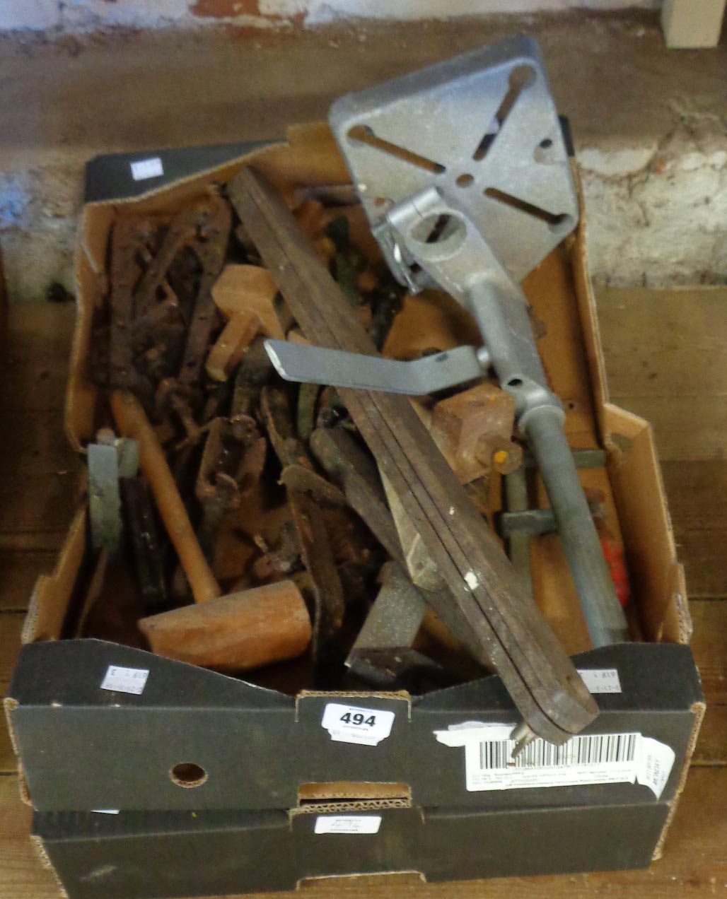 A quantity of vintage carpenter's tools including spirit levels, bradawls, set squares,