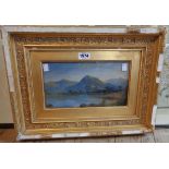 A pair of damaged gilt framed 19th Century oils on board under glass, depicting mountain lake