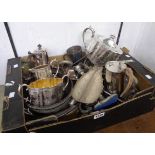 A box containing an Elkington & Co. silver plated three piece tea set, other silver plated pots,